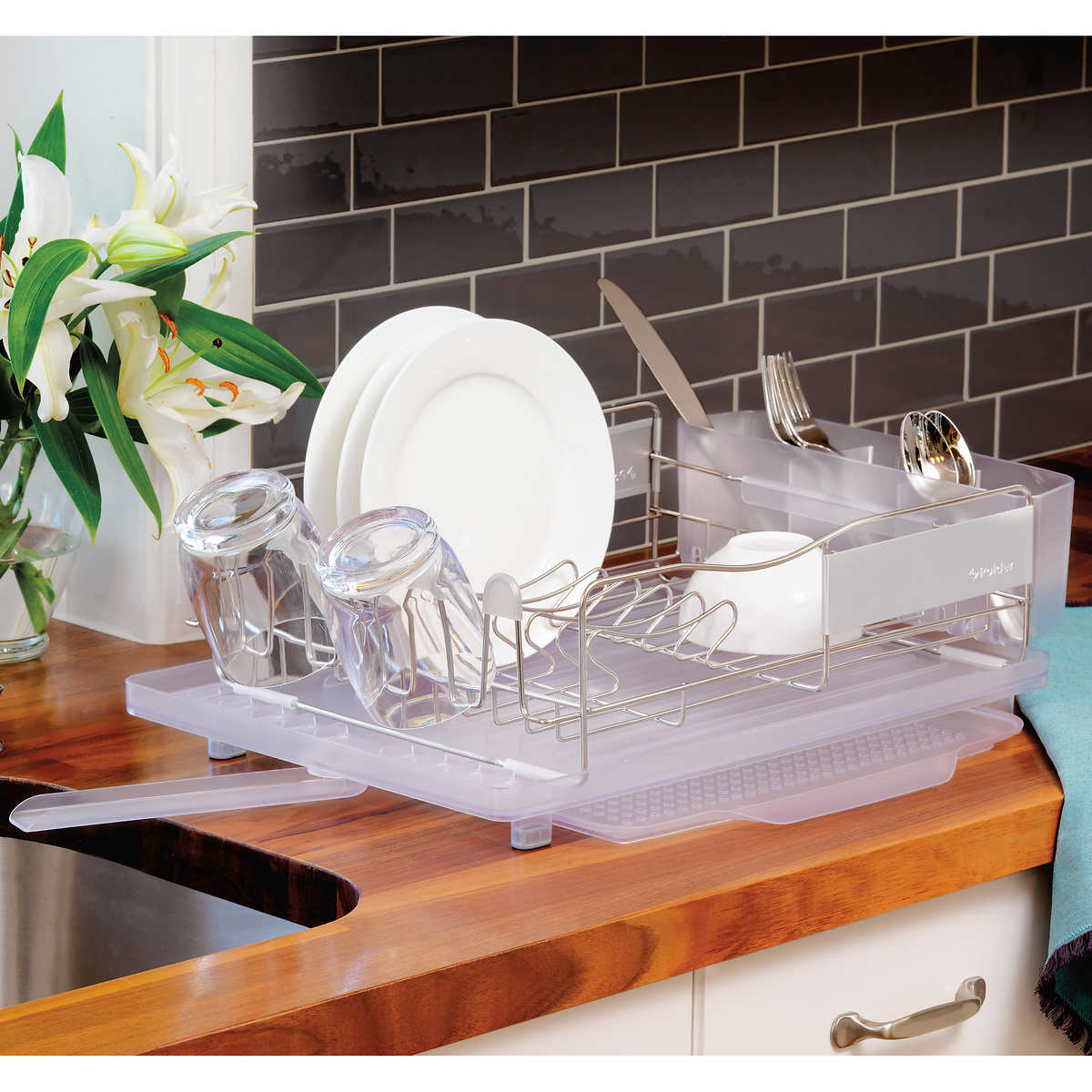 Adjustable divider and drying rack for the sink